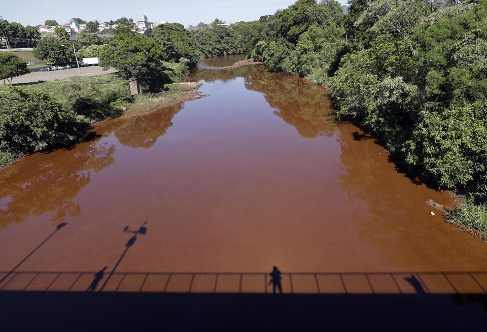 A view of the Paraobeba River in Brumadinho, Brazil, Friday, Feb. 1, 2019, polluted a week ago when a dam holding back mine waste collapsed. A Brazilian environmental group has begun testing river water in areas to measure the level of toxicity and assess risks to human and other forms of life. (AP Photo/Andre Penner)