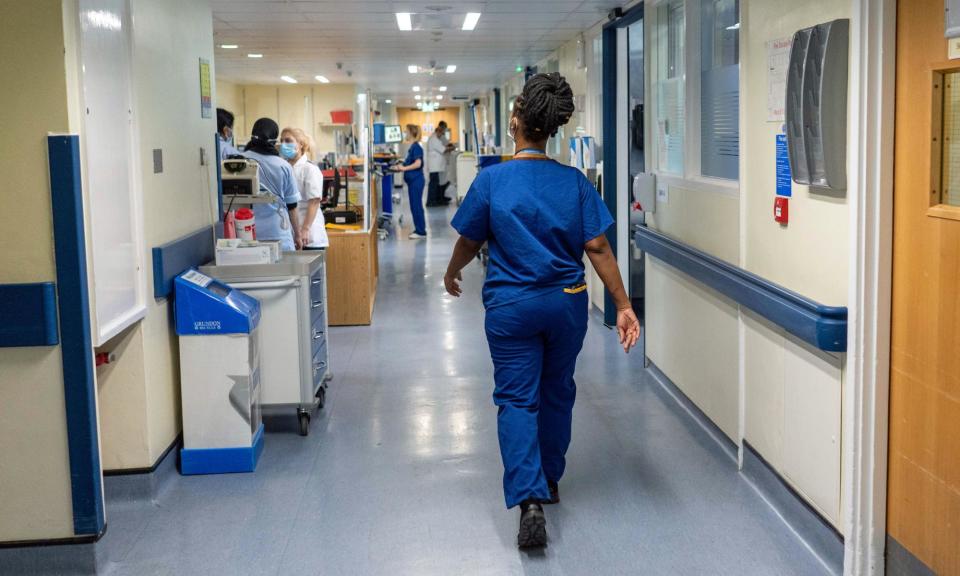 <span>Last year 85% of nurses still turned up for a shift at least once last year despite having issues such as stress, back pain, a cold, anxiety or depression.</span><span>Photograph: Jeff Moore/PA</span>