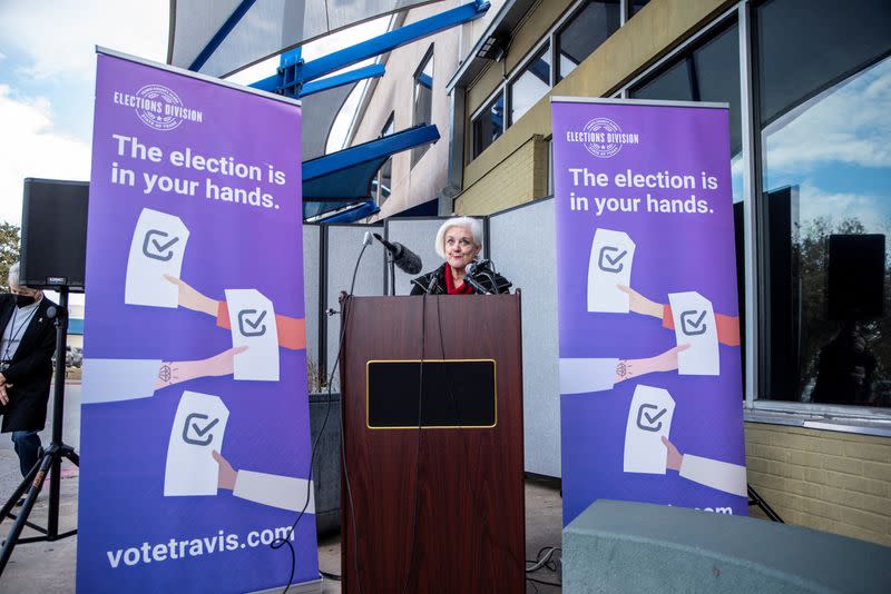 Travis County election officials hold a news conference about voters registration in Austin