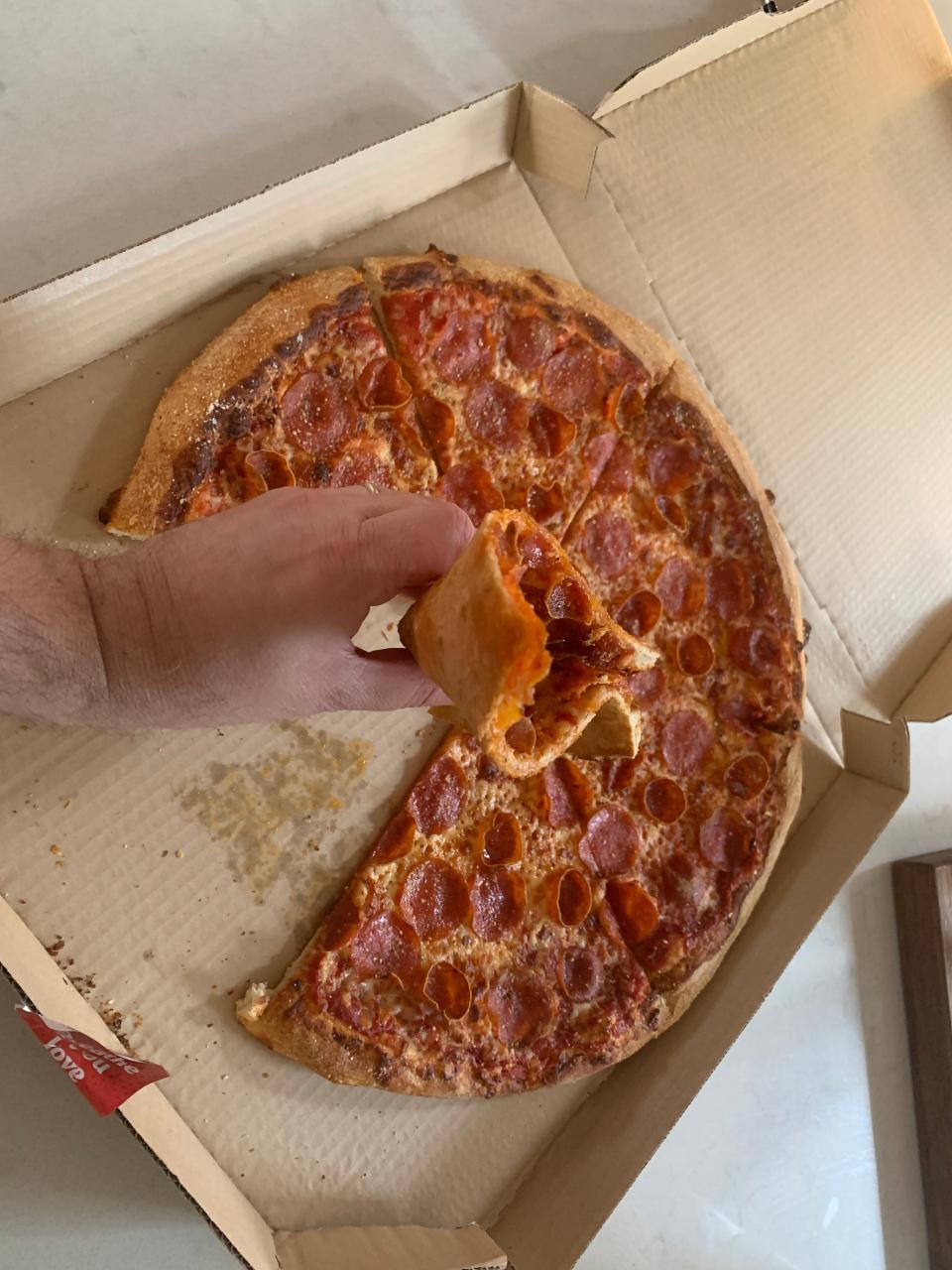 A foldable slice of Pizza Hut's Big New Yorker pizza.