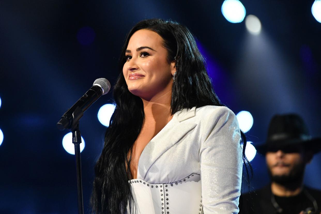 Demi Lovato recently opened up about overexercising and wishing someone recognized the signs of her eating disorder on the podcast "Pretty Big Deal With Ashley Graham." (Emma McIntyre via Getty Images)