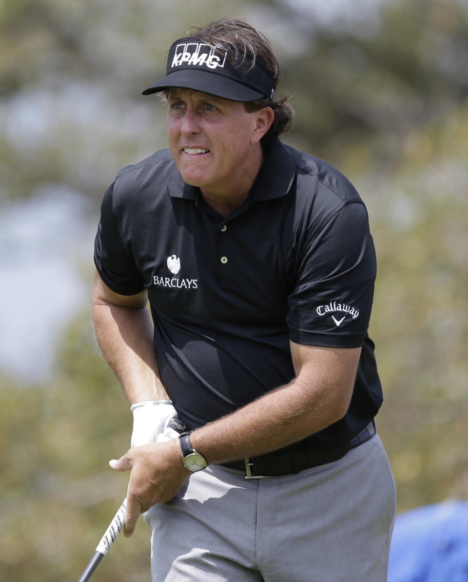 Phil Mickelson watches his drive off the second tee during the second round of the Texas Open golf tournament, Friday, March 28, 2014, in San Antonio. (AP Photo/Eric Gay)
