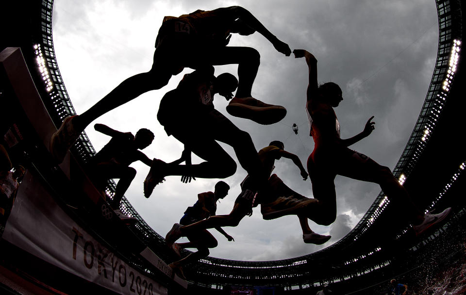 <p>Athletes compete during round one of the men's 3000m steeplechase heats on day seven.</p>