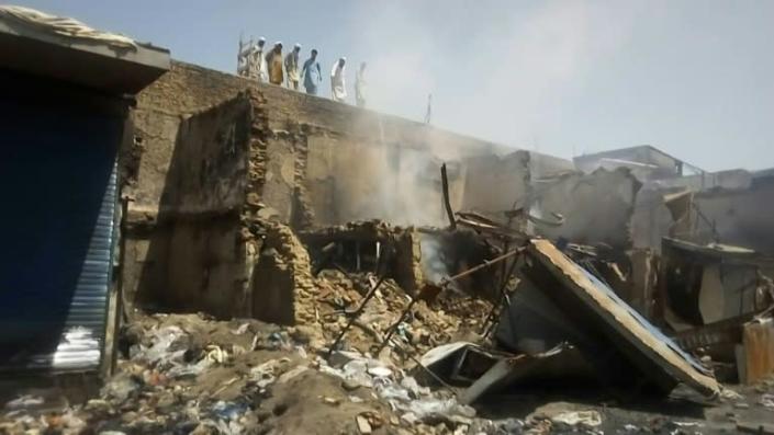 Burnt shops in the markets after Taliban seize Kunduz