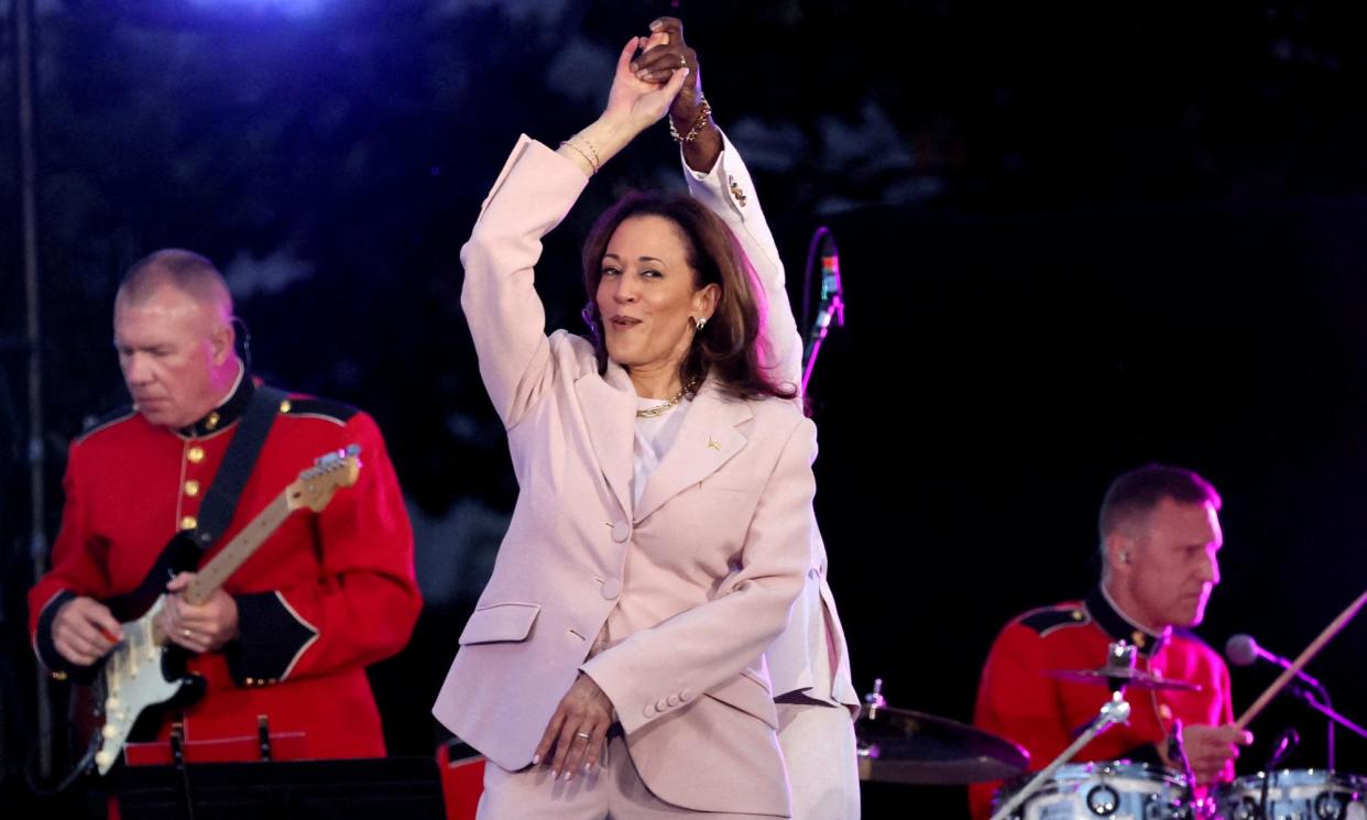 <span>Kamala Harris dances with Kirk Franklin during a Juneteenth concert hosted by Joe Biden at the White House in Washington DC, on 10 June 2024.</span><span>Photograph: Leah Millis/Reuters</span>