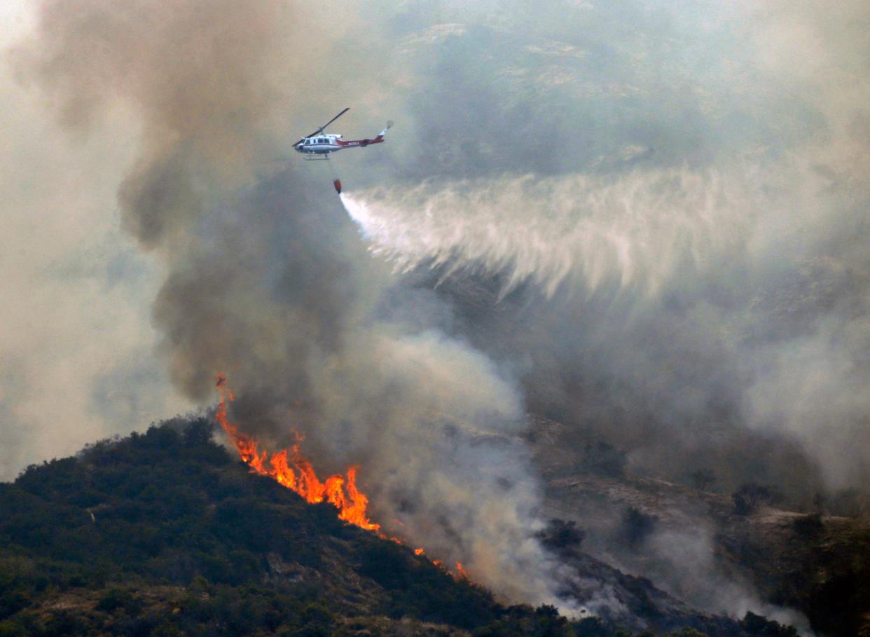 Wildfires caused by hot ash can threaten multiple homes.