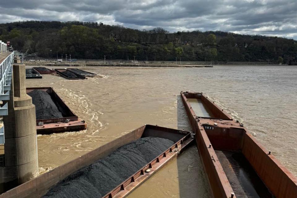 26 barges, several of which are pictured, broke loose in the Ohio River near Pittsburgh, Pennsylvania late Friday evening (U.S. Army Corps of Engineers Pittsburgh District)