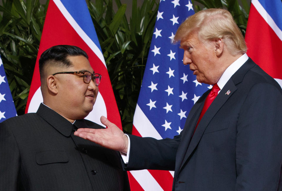 FILE - In this June 12, 2018, file photo, U.S. President Donald Trump, right, meets with North Korean leader Kim Jong Un on Sentosa Island in Singapore. With their second summit fast approaching, speculation is growing that Trump may try to persuade Kim to commit to denuclearization by giving him something he wants more than almost anything else, an announcement of peace and an end to the Korean War. (AP Photo/Evan Vucci, File)