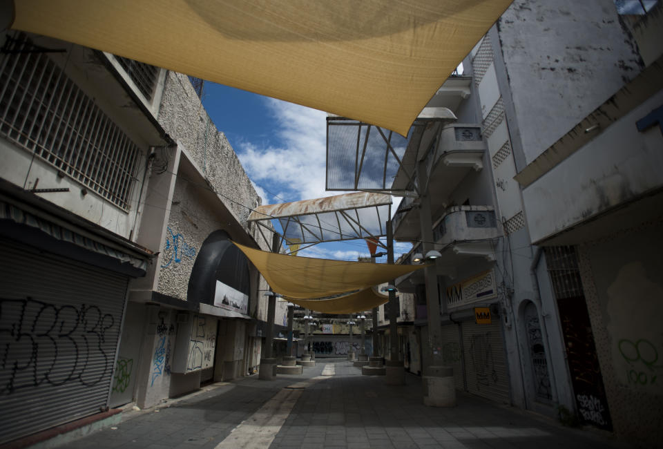 The Paseo de Diego sits empty in San Juan, Puerto Rico, Wednesday, April 17, 2019. New Census Bureau data shows that Puerto Rico lost nearly 4% of its population after Hurricane Maria - the greatest population drop in the recorded history of the island, according to one demographer. (AP Photo/Carlos Giusti)