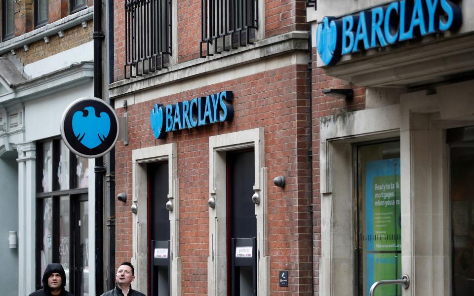 FILE PHOTO: A branch of Barclays Bank is seen, in London, Britain, February 23, 2022. REUTERS/Peter Nicholls/File Photo - PETER NICHOLLS/REUTERS