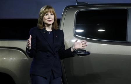 Mary Barra, incoming CEO of General Motors Co., reveals the 2015 GMC Canyon pickup truck in an industrial building in advance of the media preview of the North American International Auto Show in Detroit, Michigan January 12, 2014. REUTERS/Rebecca Cook