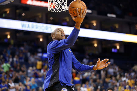 FILE PHOTO: David West of the Golden State Warriors warms up before his NBA pre-season game against the Denver Nuggets at Oracle Arena in Oakland, California, U.S., September 30, 2017. REUTERS/Stephen Lam