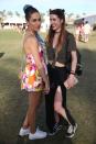 Festivalgoers pose with their topknot hairstyles.