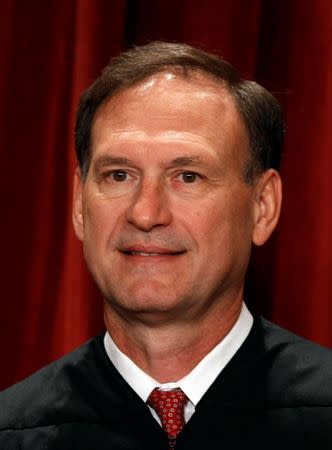 U.S. Supreme Court Associate Justice Samuel Alito Jr. poses for a portrait in the East Conference Room at the Supreme Court Building in Washington, DC, U.S. on October 8, 2010. REUTERS/Larry Downing/File Photo