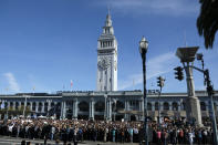 Google employees fill Harry Bridges Plaza in front of the Ferry Building during a walkout Thursday, Nov. 1, 2018, in San Francisco. Hundreds of Google employees around the world briefly walked off the job Thursday in a protest against what they said is the tech company's mishandling of sexual misconduct allegations against executives. (AP Photo/Eric Risberg)