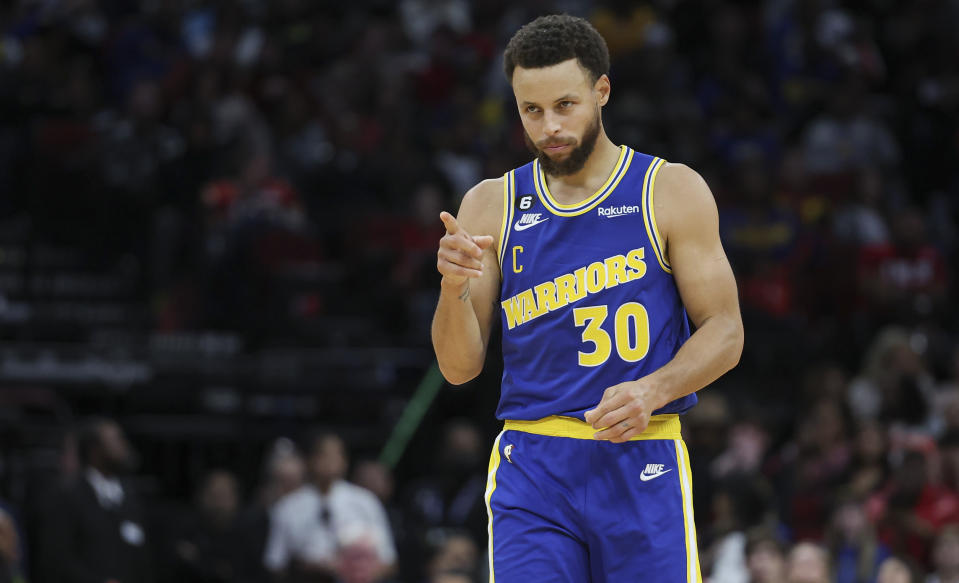 Nov 20, 2022; Houston, Texas, USA; Golden State Warriors guard Stephen Curry (30) reacts after a play during the fourth quarter against the Houston Rockets at Toyota Center. Mandatory Credit: Troy Taormina-USA TODAY Sports