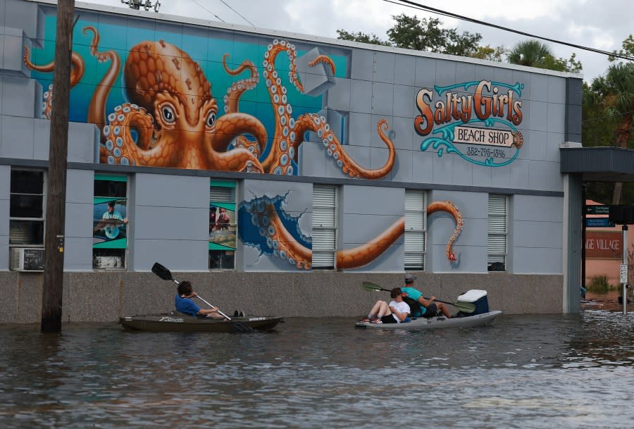 Kayakers paddle along in flood waters after Hurricane Idalia passed offshore on August 30, 2023 in Crystal River, Florida. Hurricane Idalia hit the Big Bend area on the Gulf Coast of Florida as a Category 3 storm. (Photo by Joe Raedle/Getty Images)