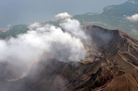 An aerial view shows the crater atop Mt. Sakurajima in Kagoshima, southwestern Japan, in this photo taken by Kyodo August 15, 2015. Mandatory credit REUTERS/Kyodo