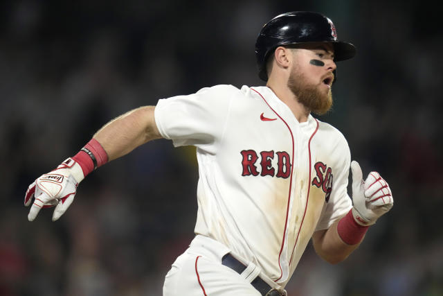 Rockies beat sloppy Red Sox 4-3 in 10 after rain delay