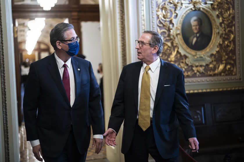 WASHINGTON, DC - FEBRUARY 12: Bruce Castor and Michael van der Veen, lawyers for former President Donald Trump, walk back to their meeting room during a break through the Senate Reception room on the fourth day of the Senate Impeachment trials for former President Donald Trump on Capitol Hill on February 12, 2021 in Washington, DC. Trump's defense lawyers will present their case on Friday, where his legal team will argue that he should be acquitted of inciting an insurrection. (Photo by Jabin Botsford - Pool/Getty Images)