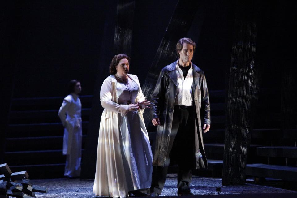 In this undated photo provided by the Houston Grand Opera, Tamara Wilson as Elisabeth de Valois and Brandon Jovanovich as Don Carlos perform in the Houston Grand Opera's production of "Don Carlos" in Houston. The Houston Grand Opera is offering the original French-language version and restoring several scenes that are still rarely included. (AP Photo/Houston Grand Opera, Felix Sanchez)