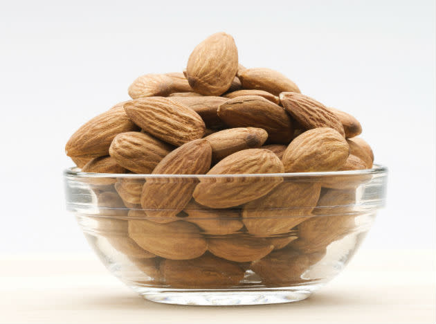 <b>Almonds:</b> Have you been avoiding nuts for the oil they contain? If yes, then bring it back to your plate because this oil is actually healthy for your heart. The Vitamin E that almonds contain helps in keeping your cholesterol level under control. Like apples, almonds are also high on fibre and Vitamin content. Again a perfect 5 PM snack. Add to your heart's health by eating 4–5 soaked almonds each morning with your breakfast.