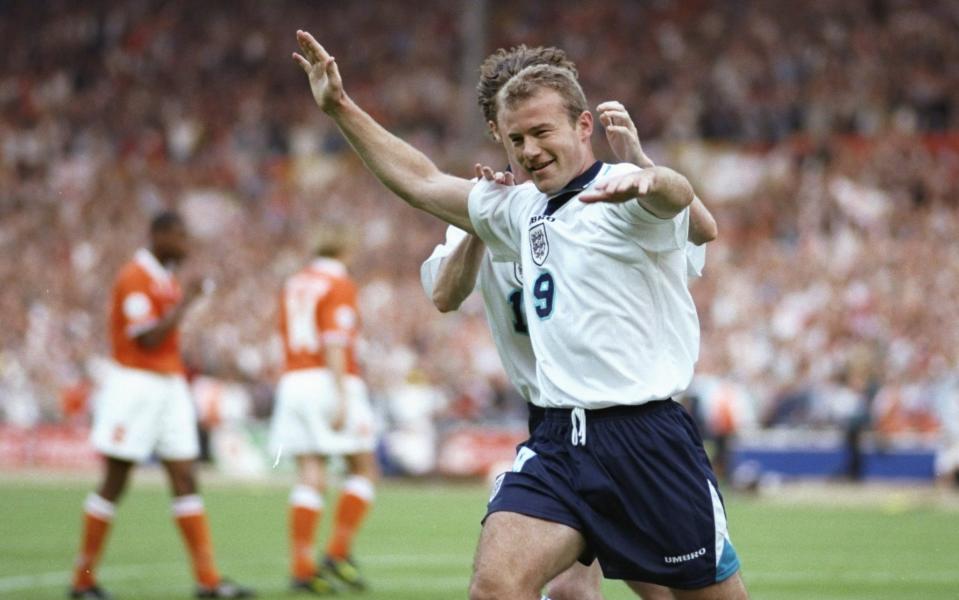 Alan Shearer celebrates scoring against Holland at Euro 96