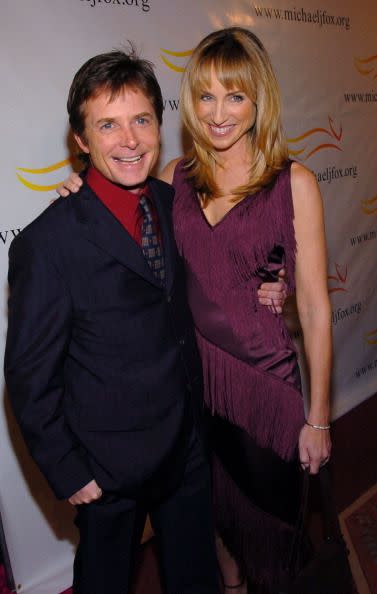 <p>Michael J. Fox: 5' 4"<br>Tracy Pollan: 5' 6"<br></p>