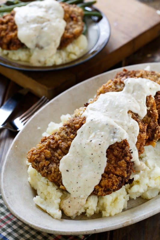 <p>Spicy Southern Kitchen</p><p>Crispy fried cubed steak covered in white country gravy.</p><p><strong>Get the recipe: <a href="http://spicysouthernkitchen.com/chicken-fried-steak/" rel="nofollow noopener" target="_blank" data-ylk="slk:Chicken Fried Steak;elm:context_link;itc:0;sec:content-canvas" class="link ">Chicken Fried Steak</a></strong></p>