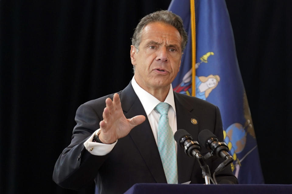 New York Gov. Andrew Cuomo speaks about the lifting of COVID-19 restrictions during a news conference at One World Trade in New York, Tuesday, June 15, 2021. Cuomo said Tuesday that 70% of adults in New York have received at least one dose of a coronavirus vaccine, a threshold he said the state would celebrate by easing many of its remaining social distancing rules and shooting off fireworks. (AP Photo/Seth Wenig)