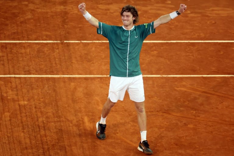 Russia's Andrey Rublev celebrates beating Canada's Felix Auger-Aliassime in the Madrid Open final on Sunday (Pierre-Philippe MARCOU)