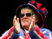 <p>A tennis fan cheers on Laura Robson of Great Britain during her Ladies' Singles second round match against Mariana Duque-Marino of Colombia on day five of the Wimbledon Lawn Tennis Championships at the All England Lawn Tennis and Croquet Club on June 28, 2013 in London, England.</p>