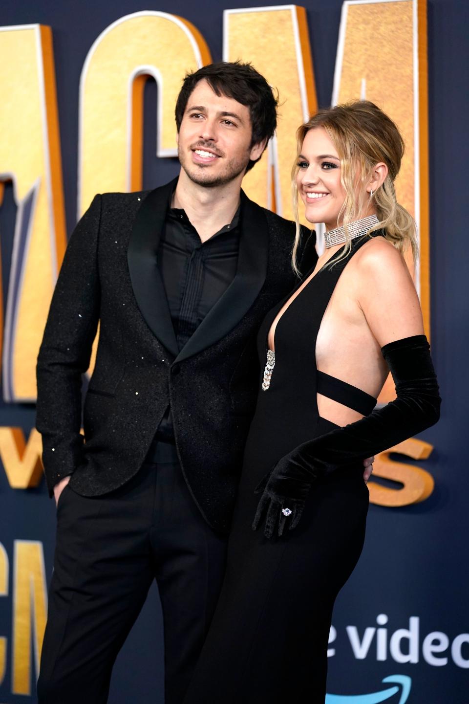 Kelsea Ballerini and Morgan Evans posing 