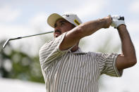 Jason Day, of Australia, watches his tee shot on the 17th hole during the second round of the Wells Fargo Championship golf tournament at Quail Hollow on Friday, May 10, 2024, in Charlotte, N.C. (AP Photo/Erik Verduzco)