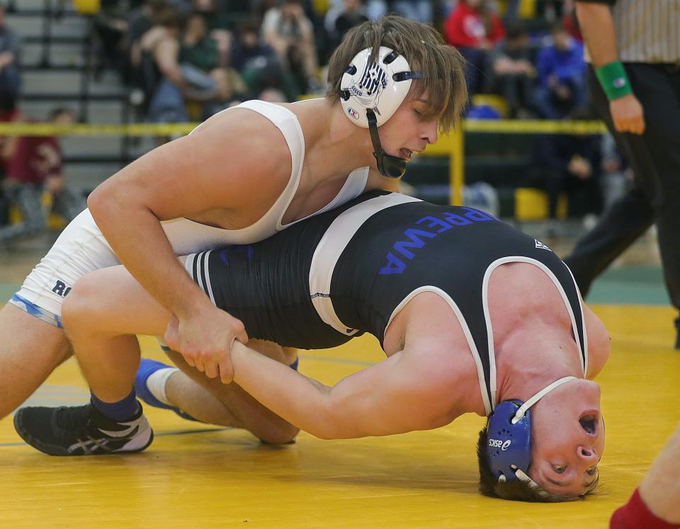 Rootstown's Cody Coontz, top, helped the Rovers to a sectional team title with an individual crown of his own.