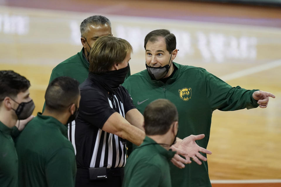 Baylor coach Scott Drew, right, argues a call during the second half of the team's NCAA college basketball game against Texas, Tuesday, Feb. 2, 2021, in Austin, Texas. (AP Photo/Eric Gay)