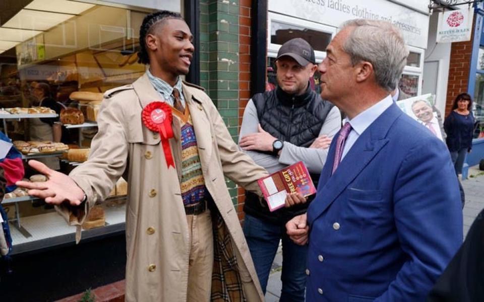 Labour candidate Jovan Owusu-Nepaul pictured with Reform leader Nigel Farage (Martin Suker)