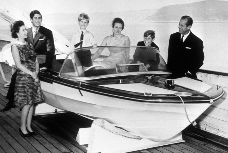 Queen Elizabeth II, the Prince of Wales, Prince Edward, Princess Anne, Prince Andrew and the Duke of Edinburgh on board the Royal Yacht Britannia during a visit to Norway. It is the photograph used on the Queen's personal Christmas card. (PA)