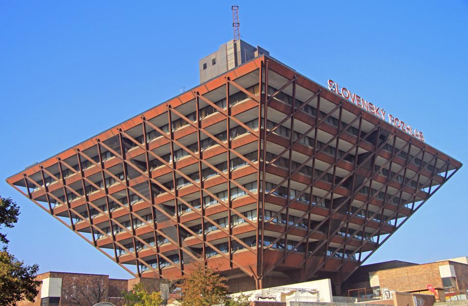 The Slovak Radio Building in Bratislava was completed in 1983, after 16 years of construction. The structure, which looks like an inverted pyramid, was designed by Štefan Svetko, Štefan Ďurkovič, and Barnabáš Kissling.