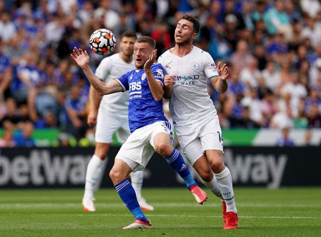 Jamie Vardy (centre) in action for Leicester