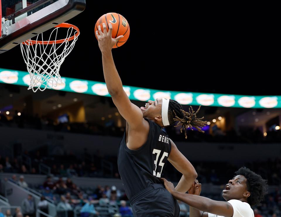 Missouri State's N.J. Benson (35) grabs a rebound during a Missouri Valley Conference Tournament game against Southern Illinois, Friday, March 3, 2023, at Enterprise Center in St. Louis. 