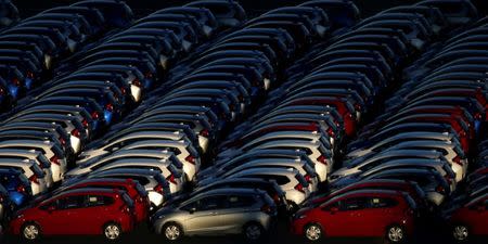 FILE PHOTO: Newly manufactured cars await export at a port in Yokohama, Japan, January 16, 2017. REUTERS/Toru Hanai