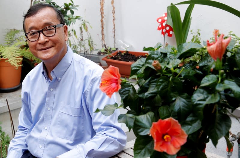 FILE PHOTO: Former president of the dissolved opposition Cambodia National Rescue Party (CNRP) Sam Rainsy, who is living in exile, poses on his terrace in Paris