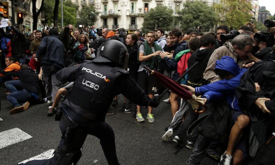 Spanish police clash with pro-independence supporters of Catalonia’s referendum in October 2017