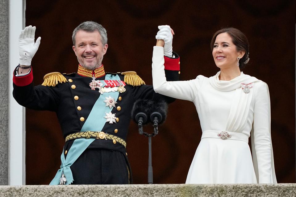 Denmark's King Frederik X and Denmark's Queen Mary wave from the balcony of Christiansborg Palace in Copenhagen, Denmark, on Jan. 14, 2024.
