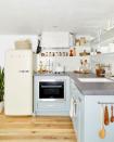 <p>While stainless steel appliances are most popular, this sleek <a href="https://www.smeg.com/" rel="nofollow noopener" target="_blank" data-ylk="slk:Smeg" class="link ">Smeg</a> fridge proves that white appliances can look just as chic. Lighten up your space by pairing it with crisp white tiles, light wood floors and baby blue cabinets.</p><p><em><a href="https://stylebyemilyhenderson.com/blog/velindas-makeover-takeover-small-kitchen-ideas" rel="nofollow noopener" target="_blank" data-ylk="slk:See more at Style by Emily Henderson »" class="link ">See more at Style by Emily Henderson »</a> </em></p>