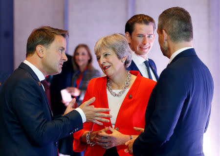 Britain's Prime Minister Theresa May, Luxembourg's Prime Minister Xavier Bettel and Austrian Chancellor Sebastian Kurz attend the European Union leaders informal summit in Salzburg, Austria, September 20, 2018. REUTERS/Leonhard Foeger