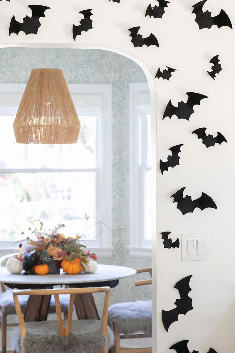 <p>Frame a doorway with flying paper bats for a super simple but fun Halloween vibe at home. Learn how from <a href="https://sugarandcharm.com/inexpensive-halloween-decorating-ideas" rel="nofollow noopener" target="_blank" data-ylk="slk:Sugar and Charm;elm:context_link;itc:0;sec:content-canvas" class="link ">Sugar and Charm</a>. </p><p><a class="link " href="https://www.amazon.com/SunWorks-Construction-12-Inches-18-Inches-100-Count/dp/B002LARR9E/?tag=syn-yahoo-20&ascsubtag=%5Bartid%7C10057.g.2554%5Bsrc%7Cyahoo-us" rel="nofollow noopener" target="_blank" data-ylk="slk:BUY NOW;elm:context_link;itc:0;sec:content-canvas">BUY NOW</a> <strong><em>Black Construction Paper, $10</em></strong></p>