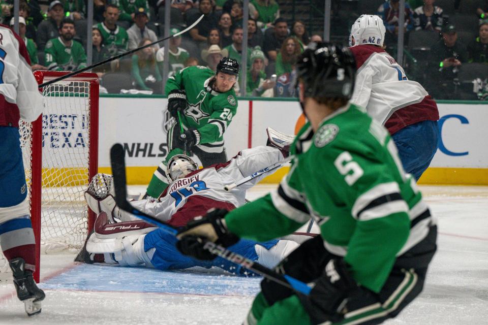 Dallas Stars center Roope Hintz (24) scores a goal during the second period of Game 2 against the Colorado Avalanche.