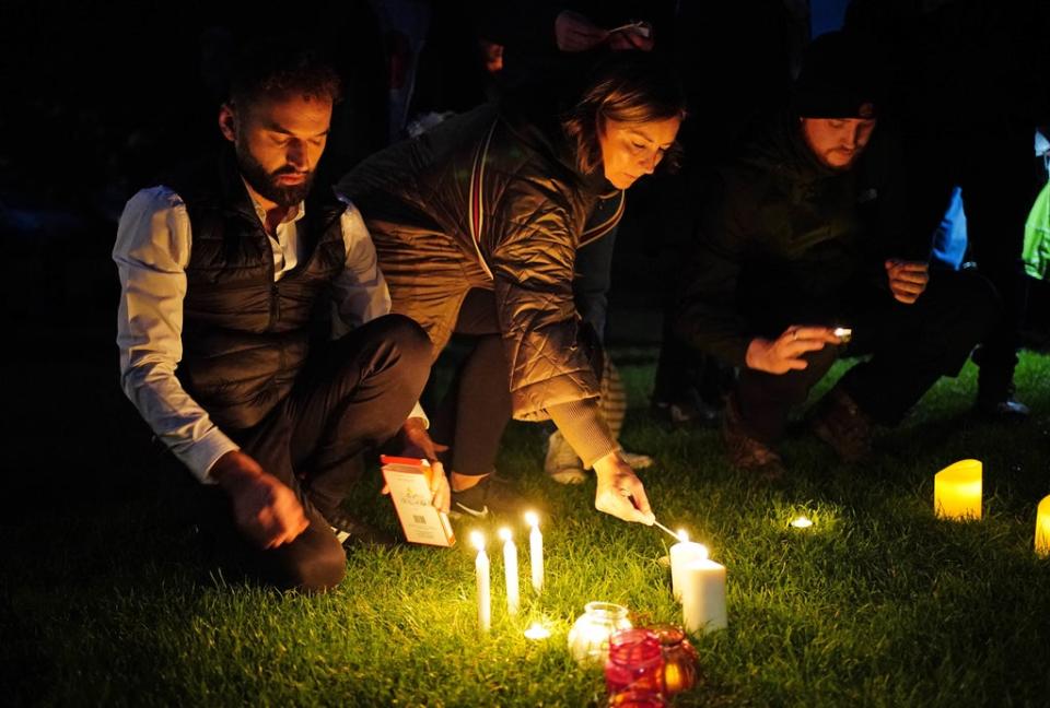 Well-wishers light candles at Belfairs Recreation Ground in Leigh-on-Sea, Southend on Saturday (PA)